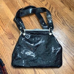 Barney’s black handbag